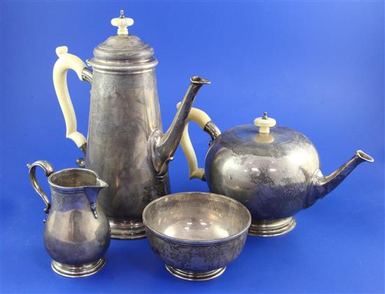 A George V 18th century style silver four piece tea and coffee service by Goldsmiths & Silversmiths Co Ltd, gross 74 oz.